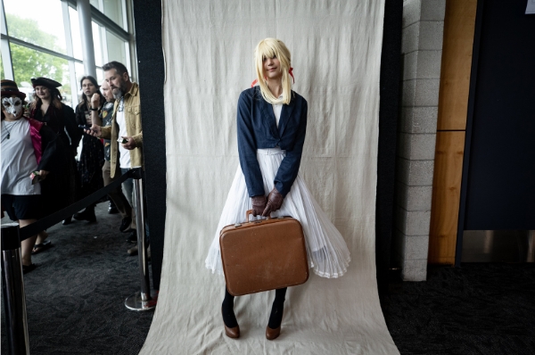 Woman posing in costume at science fiction convention, Armageddon